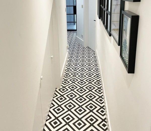 Black and white checked vinyl floor